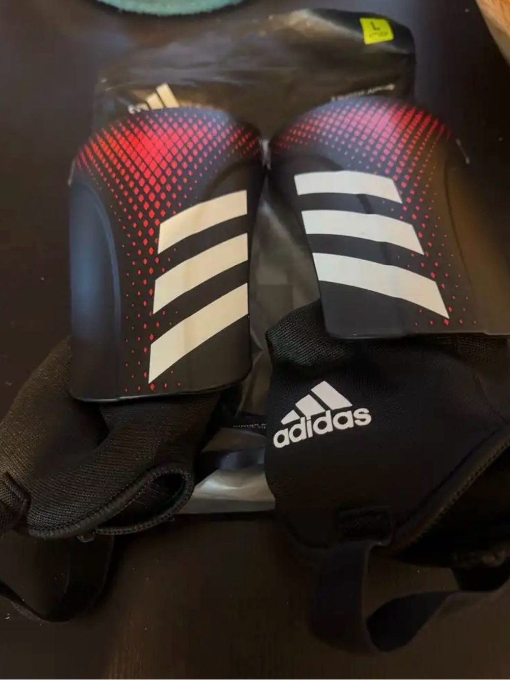Adidas soccer shin guards with straps, size L junior